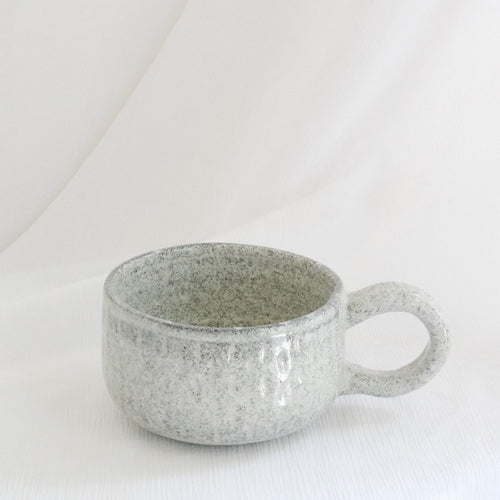 Textured stone mug